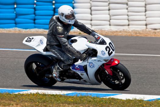 JEREZ DE LA FRONTERA, SPAIN - APR 17: Stock Extreme motorcyclist Juan Alonso takes a curve in the CEV Championship race on April 17, 2011 in Jerez de la Frontera, Spain
