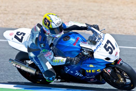 JEREZ DE LA FRONTERA, SPAIN - APR 17: Stock Extreme motorcyclist Ferran Casas takes a curve in the CEV Championship race on April 17, 2011 in Jerez de la Frontera, Spain