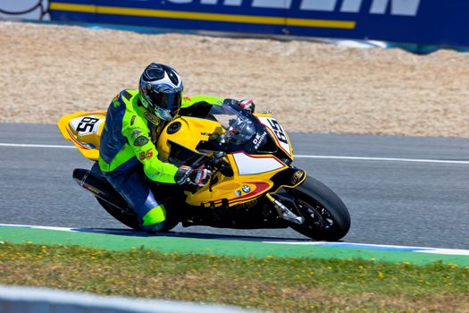 JEREZ DE LA FRONTERA, SPAIN - APR 17: Stock Extreme motorcyclist Juan Eric Gomez takes a curve in the CEV Championship race on April 17, 2011 in Jerez de la Frontera, Spain