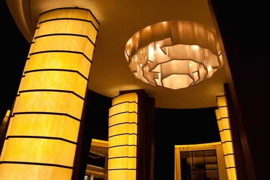 An empty modern hotel lobby with light columns
