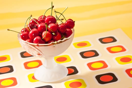 food series: red cherries in glassy bowl