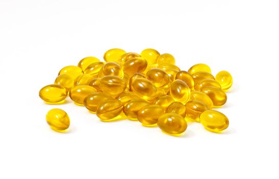 Close up of yellow gel capsules.