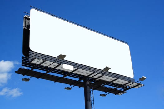 empty billboard on background of blue sky