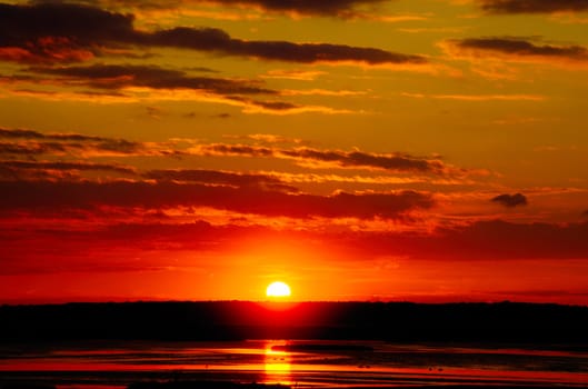 Dramatic sunset with stormy clouds, Edwin B Forsyth National Wildlife Refuge