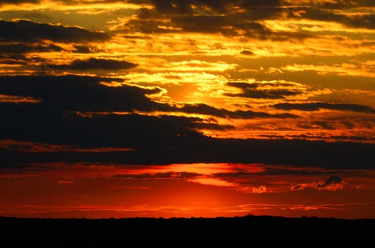 Dramatic sunset with stormy clouds, Edwin B Forsyth National Wildlife Refuge