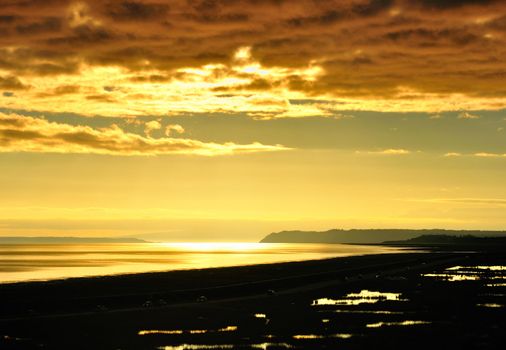 Golden sunset at Turnagain Arm near Anchorage, Alaska.