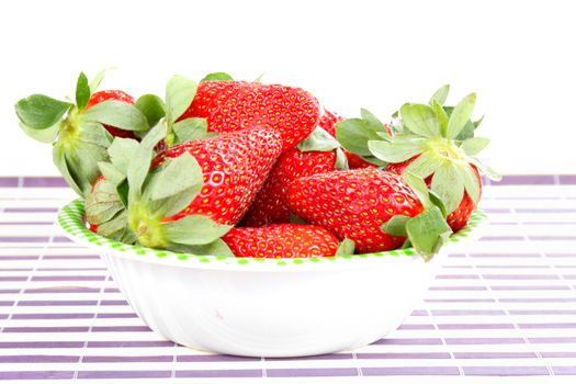 You have fresh strawberries in the bowl