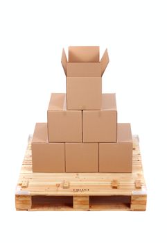 cardboard boxes on wooden palette