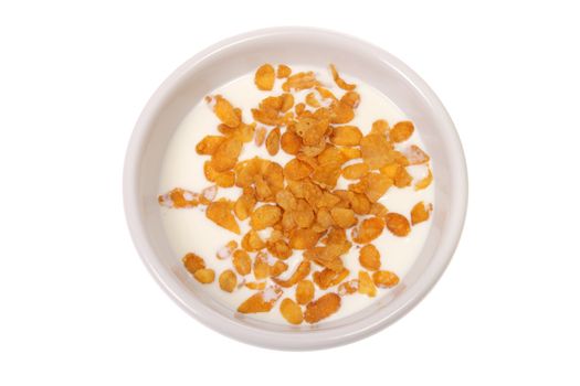 Bowl with corn flakes and milk, photo on white