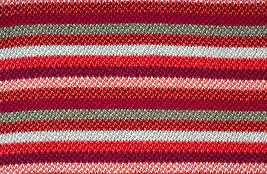 colors striped woollen sweater, abstract background