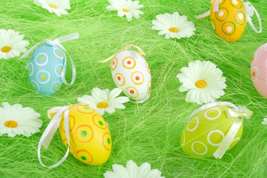 Painted Colorful Easter Eggs on green Grass