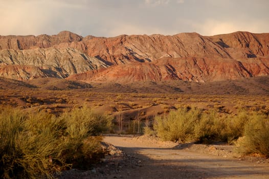 Dirt road in dry rocky mountains in northern argentina