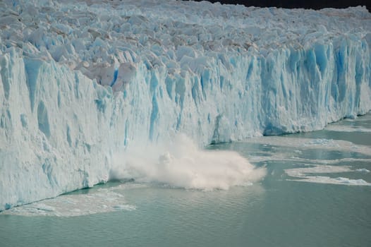 Massive ice piece breaking off Perito Moreno glacier, Patagonia