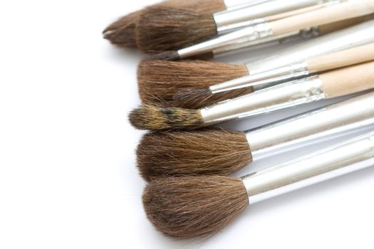 Different thickness proffesional brushes on white background