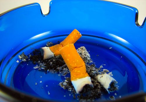 ashtray and cigarette butts