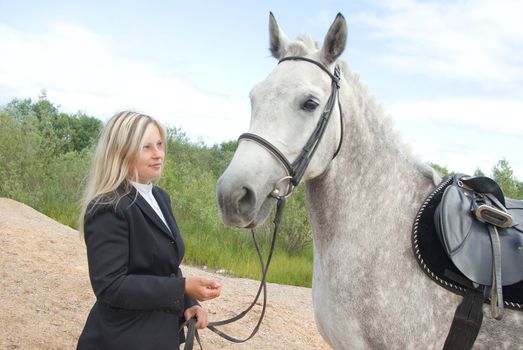 girl with horse.Friendship of an animal and the person