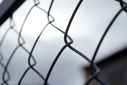 metal grate  on light background.Background from metallic lattice
