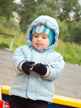 Boy Playing at the Playground