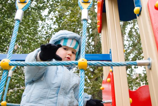 Boy Playing at the Playground