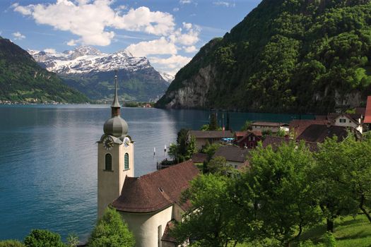 Looking over the church in Bauen onto Lake Lucerne in Switzerland.

