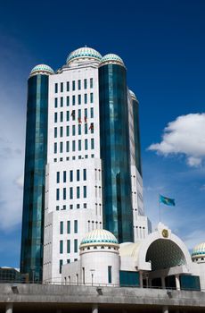 Building of parliament (maslihat) of Kazakhstan Republic. Climbers clear windows.