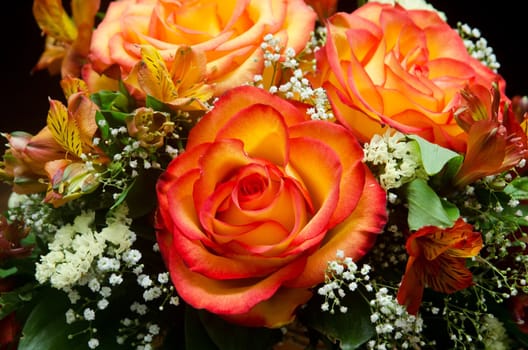 closeup of vibrant orange roses flower bouquet