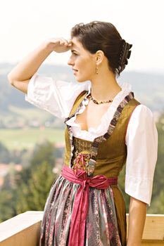 Bavarian girls from enjoying the view from the balcony