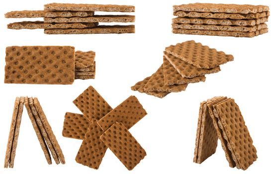 biscuits, crack bread aranged in different shape isolated on white background