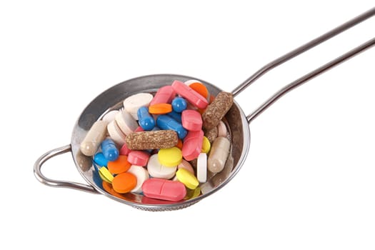 colorful capsule, pill and tablet on white background