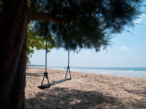 Swing in shady of pine, Chao Lao beach, Chanthaburi, Thailand