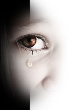 Little sad girl with tears in her eyes