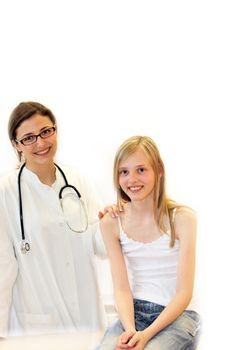Young doctor and child in the investigation. Both smiling towards the camera
 - Copy Space