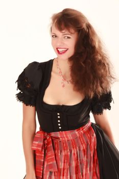 Young smiling girl in traditional Bavarian costume