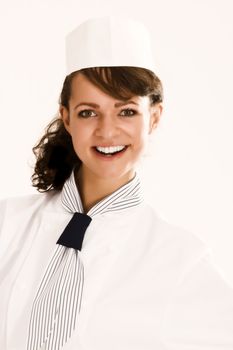 Portrait of a female, smiling chef apprentice