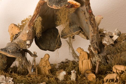 Representation of a Nativity scene carved from walnut