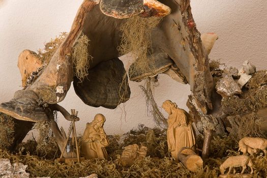 Representation of a Nativity scene carved from walnut