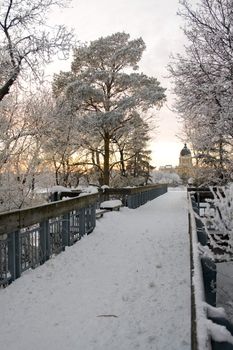 Snow covered Path to the Saskatchewan Legislative Building during sunset