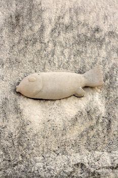 Fish carved on a stone on the island of Brac.