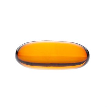 Single vitamin E pill isolated on white background.