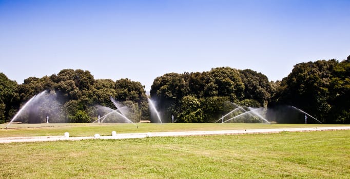 Reggia di Caserta (Caserta Royal Palace), Italy. Luxury royal garden: irrigation operations