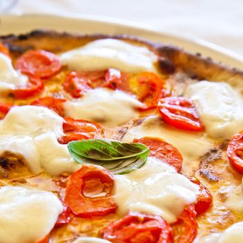 This is a true Italian Pizza. Traditional Pizza Margherita served in a Capri's restaurant, Naples Gulf, Italy.