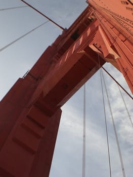 View from the deck looking straight up to one of the towers of the Golden Gate Bridge in San Francisco, California