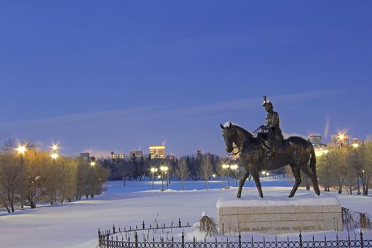 Statue of her Majesty Queen Elizabeth II riding a horse in front of the legislative building in Regina, Canada