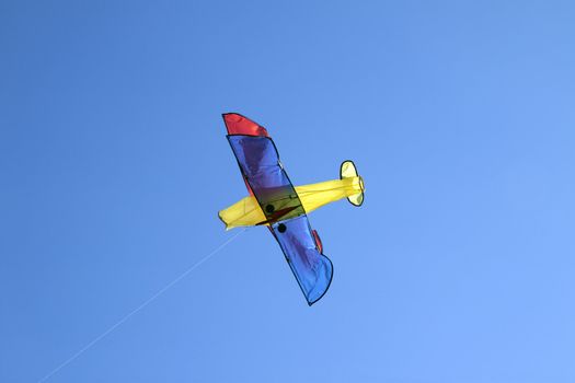 Kite. Airplane in the sky