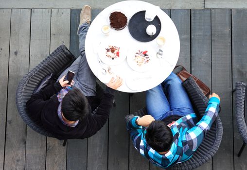 Aerial view of two man talking