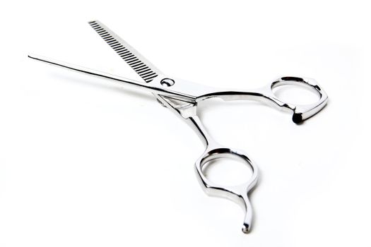 Professional Haircutting Scissors. Studio isolation on white. 
