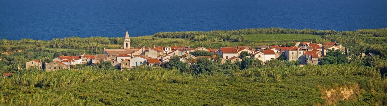 Mediterranean village on Island of Susak, Croatia - village on sandy island in reed and bamboo jungle