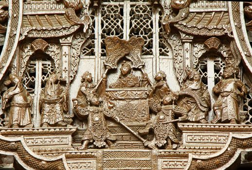Chinese old story stone carving with group people. 