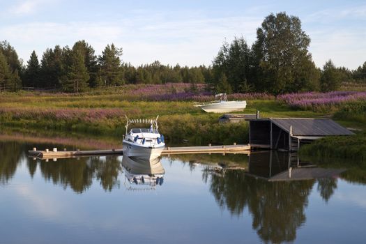 The quiet harbor on the lake. Evening Landscape