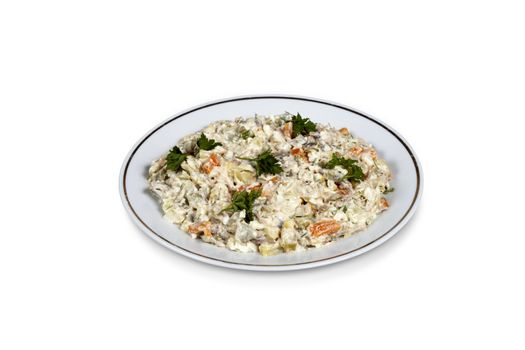 Olivier salad on a plate. Isolated on white with clipping path